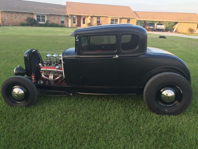 What are some specifications of the 1931 Ford Model A Coupe?