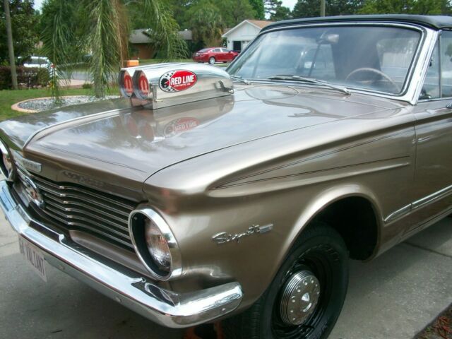 1964 Plymouth Valiant Signet 200 convertible.