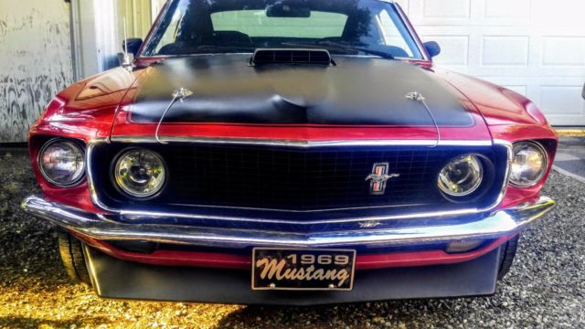 1969 Ford Mustang red with black stripes & hood