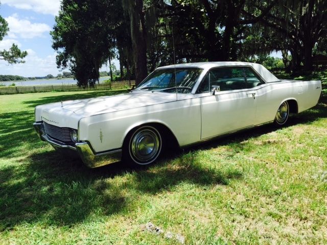 1966 Lincoln Continental triple white