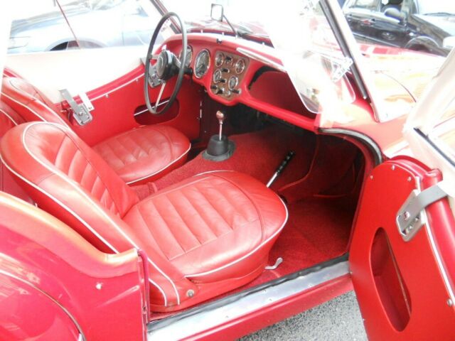 1960 Triumph TR3 Red leather