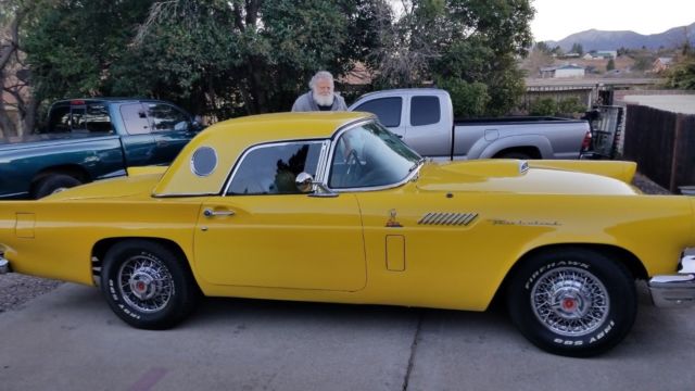 1957 Ford Thunderbird black and yellow interior