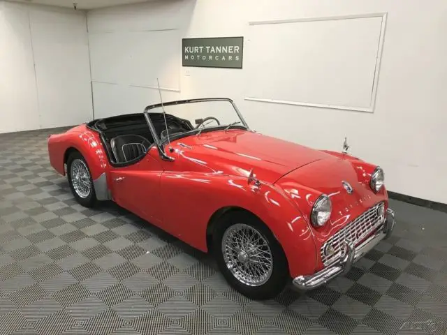 1963 Triumph TR3 4-SPEED. 60-SPOKE WIRES. WOOD/ALLOY STEERING WHEEL.