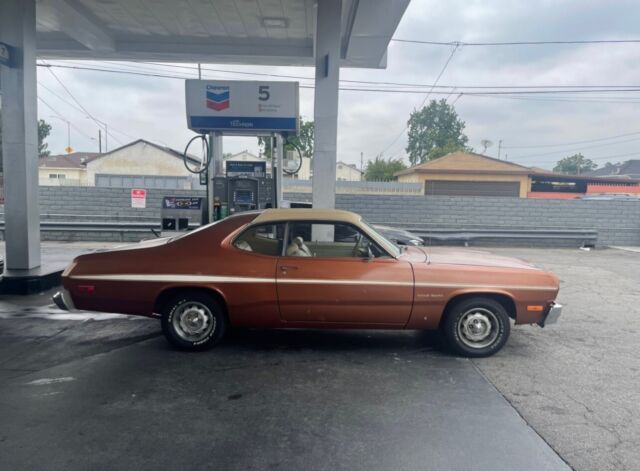 1974 Plymouth Duster gold duster