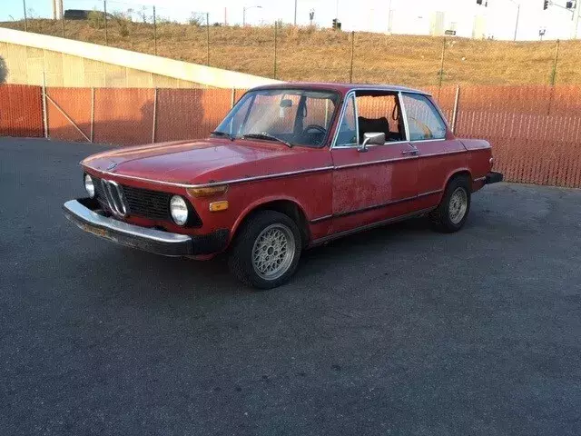 1976 BMW 2002 STOCK TRIM, aftermarket stereo