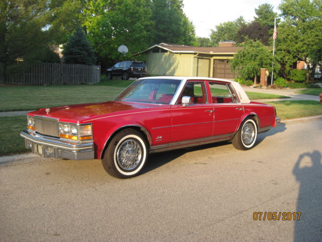 1979 Cadillac Seville bright red leather