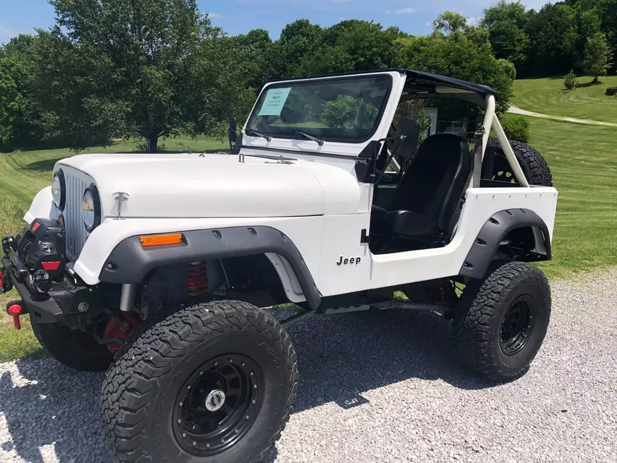 1982 Jeep Wrangler White Rhino Lining outside Black inside