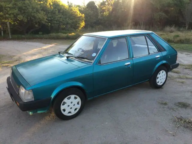 1985 Mazda 323 Chrome and black