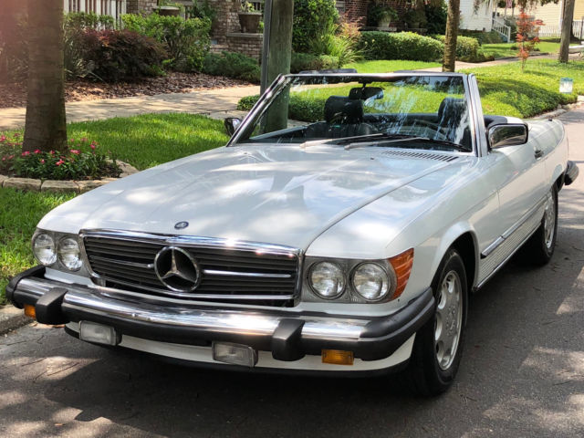 1987 Mercedes-Benz SL-Class 68k car in 717 Papyrus White ext. w. Blue LEATHER