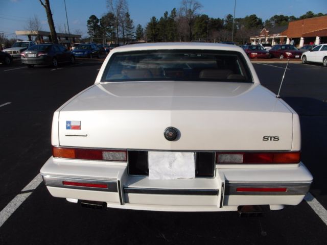 1990 Cadillac STS pearl white