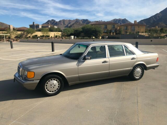 1990 Mercedes-Benz 500-Series Smoke Silver with Chrome Trim and Brown Leather