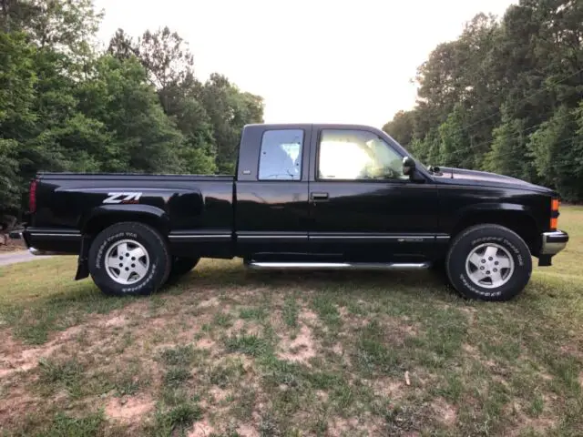 1994 Chevrolet C/K Pickup 1500 Blk with wood grain trim and leather