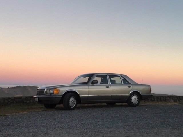 1988 Mercedes-Benz 500-Series Smoke Silver with Chrome Trim and Brown Leather