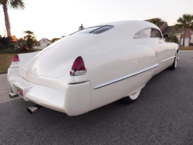 1949 Cadillac Series 62 Peach burlap w/ white vinyl
