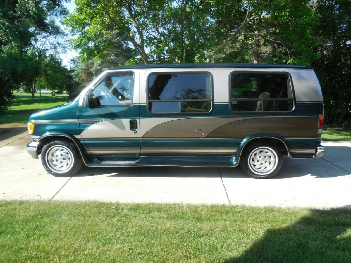1994 Ford E-Series Van Custom paint with running boards.
