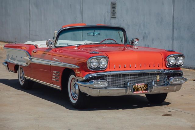 1958 Pontiac Bonneville Red and White leather bucket seats