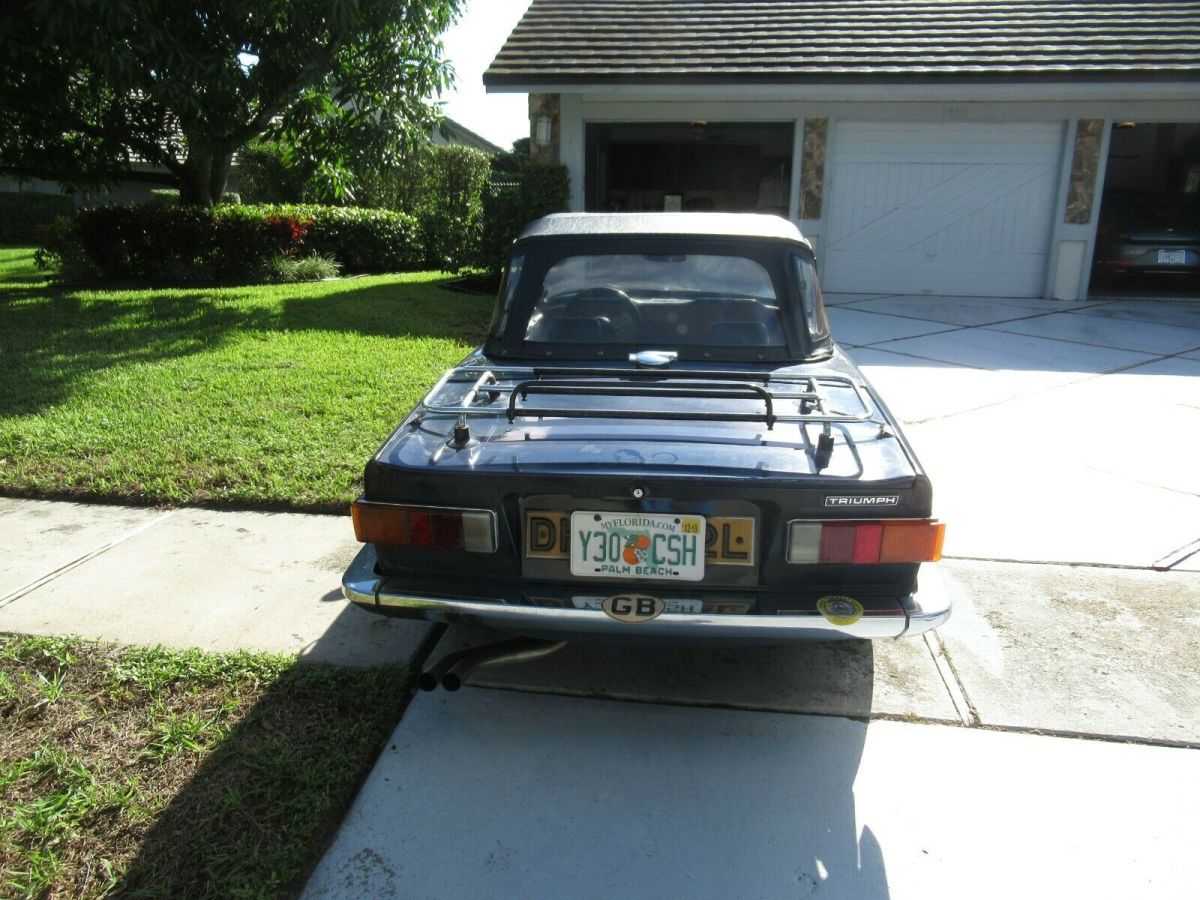 1973 Triumph TR-6 dark blue black seats and roof